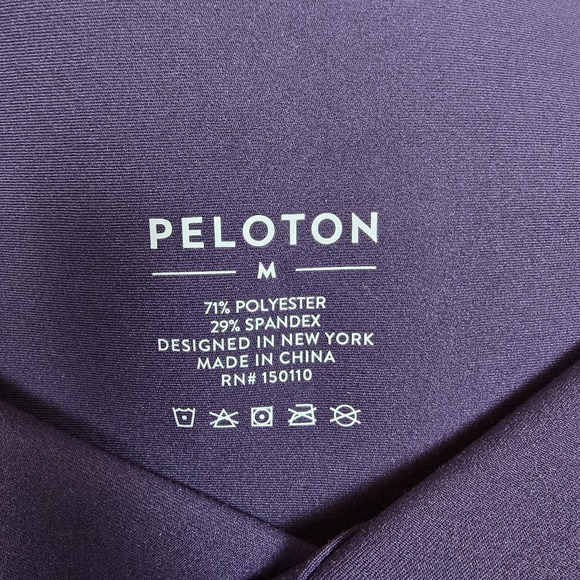 Peloton Cadent Womens Medium Bike Shorts Purple Logo Cross Front Athletic Gym - Picture 3 of 3